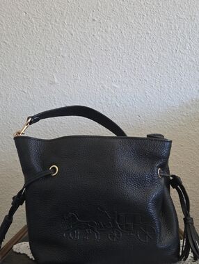 Black Leather Tote Bag with Embossed Coach-and-Carriage Detail
